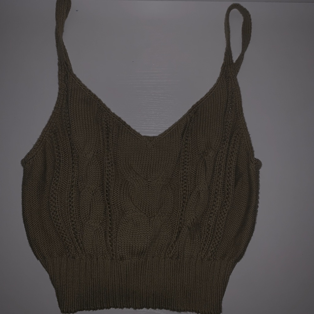 Slightly cropped light ish green shirt